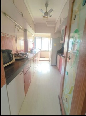 Kitchen in 3 BHK Apartment at Jangid Heights, Ghodbunder Road – for Sale