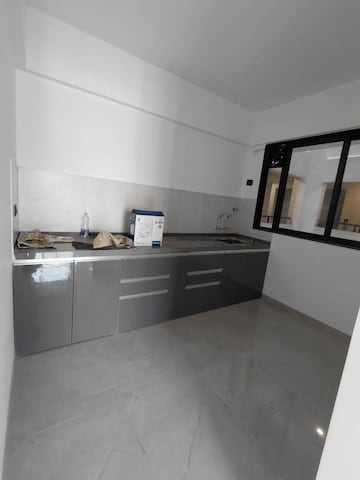 Kitchen in 2 BHK Apartment at Unique Youtopia, Kharadi – for Rent