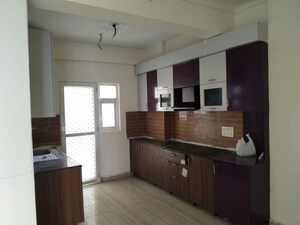 Kitchen in 3 BHK Apartment at Amrapali Dream Valley, Tech Zone 4 Greater Noida – for Sale