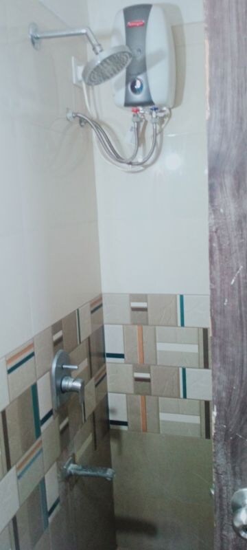 Bathroom in 2 BHK Apartment at Bindra Sateri Legacy, Andheri East – for Rent