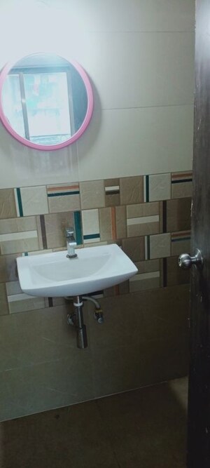 Bathroom in 2 BHK Apartment at Bindra Sateri Legacy, Andheri East – for Rent
