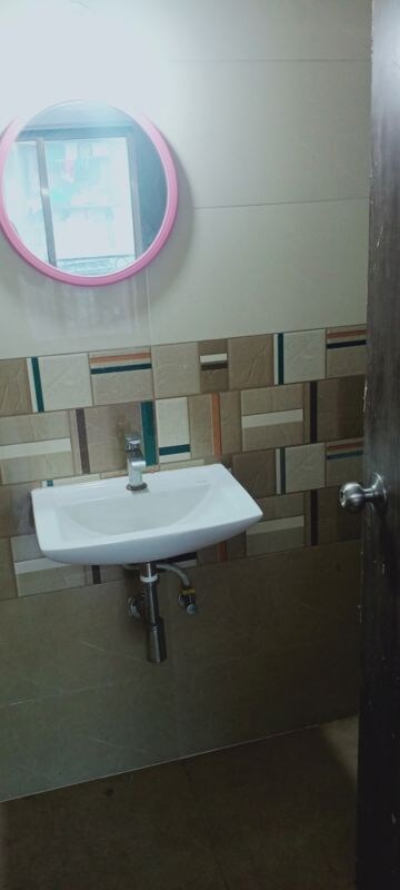 Bathroom in 2 BHK Apartment at Bindra Sateri Legacy, Andheri East – for Rent