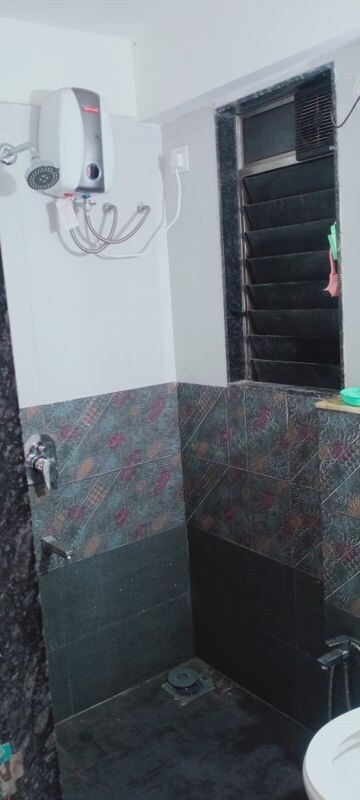 Bedroom in 2 BHK Apartment at Bindra Sateri Legacy, Andheri East – for Rent