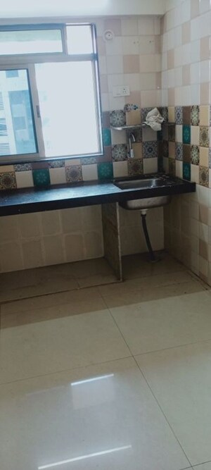 Kitchen in 2 BHK Apartment at Bindra Sateri Legacy, Andheri East – for Rent