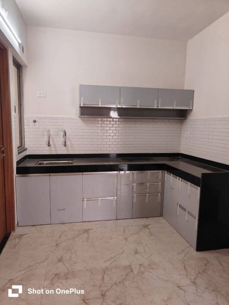 Kitchen, guru-vista-chs 2 Bedroom 900 Sq.Ft. Apartment In Kharadi Pune 10012128