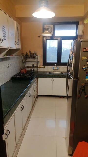 Kitchen in 3 BHK Apartment at ATS Greens I, Sector 50 – for Sale