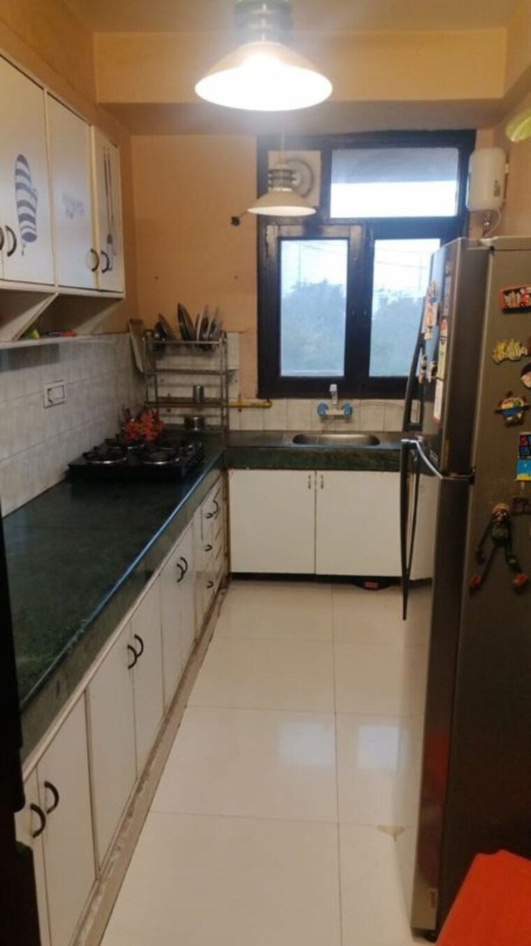 Kitchen, ats-greens-i 3 Bedroom 1260 Sq.Ft. Apartment In Sector 50 Noida 10012136