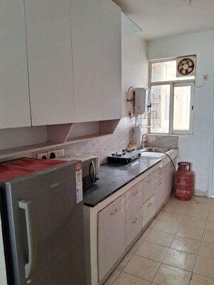 Kitchen in 3 BHK Builder Floor at DLF Gardencity Enclave, Sector 93 – for Sale