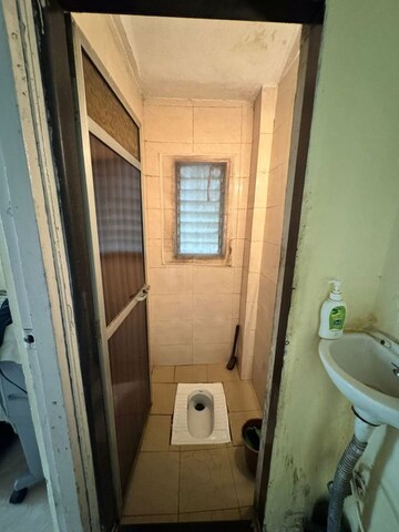 Bathroom in 1 BHK Apartment at Hiten MIG Complex, Mira Road – for Sale