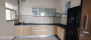 Kitchen in 2 BHK Apartment at Gera Song Of Joy, Kharadi – for Rent
