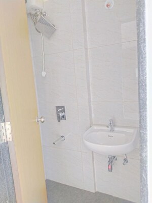 Bathroom in 2 BHK Apartment at Ani Anu Sri Balaji Enclave, Malad West – for Sale