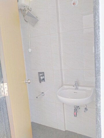 Bathroom in 2 BHK Apartment at Ani Anu Sri Balaji Enclave, Malad West – for Sale