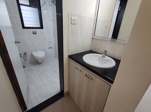 Bathroom in 2 BHK Apartment at Ani Anu Sri Balaji Enclave, Malad West – for Sale