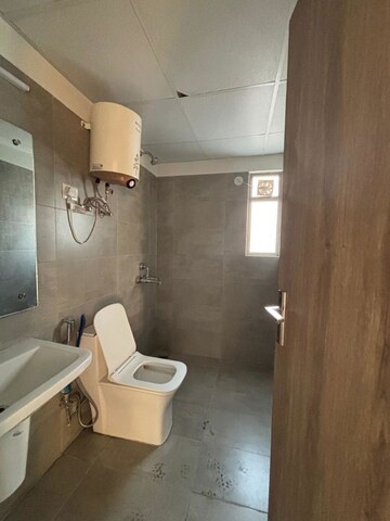 Bathroom in 2 BHK Builder Floor at Vatika India Next, Sector 82 – for Rent
