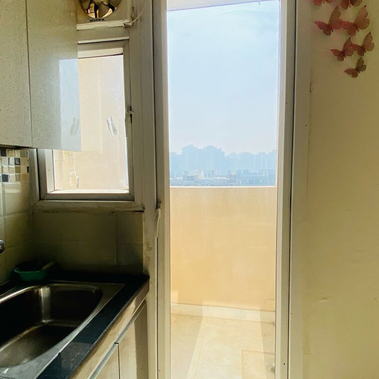 Kitchen, signature-orchard-avenue-2 2 Bedroom 656 Sq.Ft. Apartment In Hayatpur Gurgaon 10012373