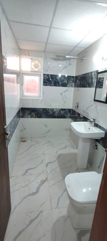 Bathroom in 4 BHK Apartment at Uninav Eden, Raj Nagar Extension – for Rent