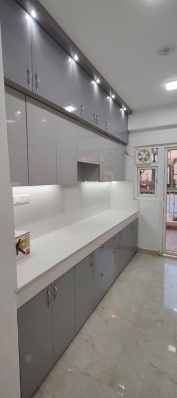 Kitchen in 4 BHK Apartment at Uninav Eden, Raj Nagar Extension – for Rent