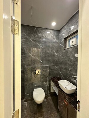 Bathroom in 3 BHK Builder Floor at Tilak Nagar – for Sale