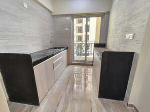 Kitchen in 2 BHK Apartment at Siddhi Highland Springs, Dhokali – for Sale