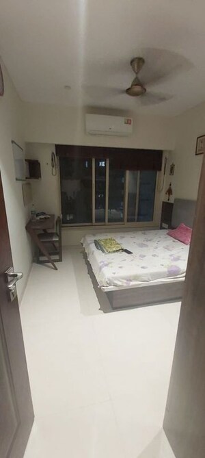 Bedroom in 2 BHK Apartment at Rizvi Oak, Malad East – for Rent
