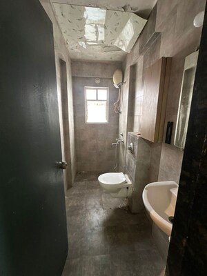 Bathroom in 2 BHK Apartment at Sai Raj Heights, Punawale – for Rent