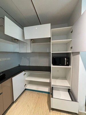 Kitchen in 3 BHK Apartment at Mahagun Mezzaria, Sector 78 – for Rent