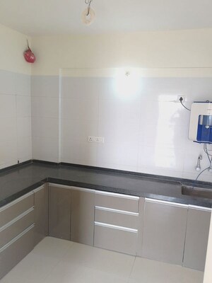 Kitchen in 2 BHK Apartment at Goodwill Nirmiti, Lohgaon – for Rent