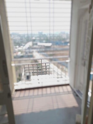 Balcony in 2 BHK Apartment at Goodwill Nirmiti, Lohgaon – for Rent