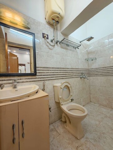 Bathroom in 3 BHK Apartment at Nehru Place – for Sale