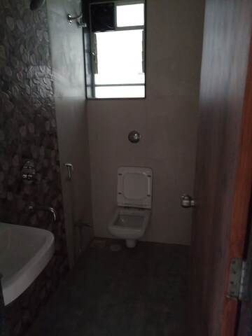 Bathroom in 4 BHK Apartment at Mayur Colony – for Rent