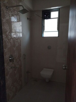 Bathroom in 4 BHK Apartment at Mayur Colony – for Rent