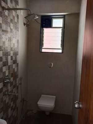 Bathroom in 4 BHK Apartment at Mayur Colony – for Rent