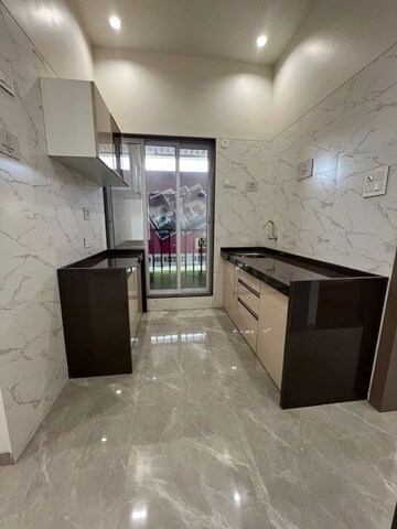 Kitchen in 2 BHK Apartment at Rajlaxmi Nakshatra Auris, Nalasopara West – for Sale