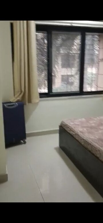 Room in 2 BHK Apartment at K Raheja Palm Court, Malad West – for Rent