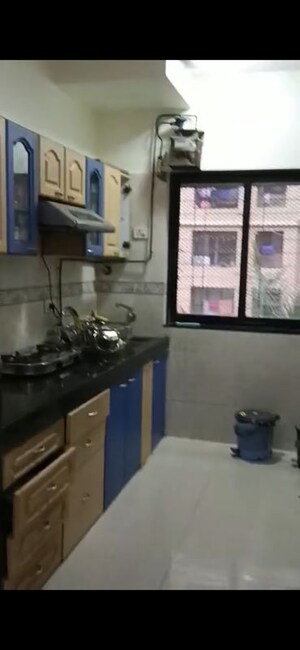 Kitchen in 2 BHK Apartment at K Raheja Palm Court, Malad West – for Rent