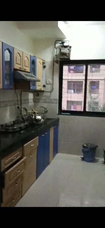 Kitchen in 2 BHK Apartment at K Raheja Palm Court, Malad West – for Rent