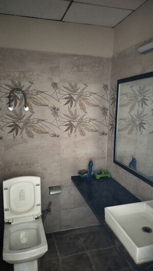 Bathroom in 1 BHK Apartment at Paramount Golfforeste, Zeta I Greater Noida – for Rent