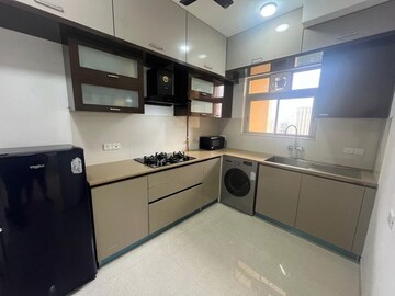 Kitchen in 2 BHK Apartment at Hiranandani Delanna, Ghodbunder Road – for Rent