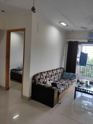 Living Room in 2 BHK Apartment at Triveni Vasant Vihar CHS, Vasant Vihar – for Rent