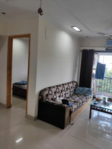 Living Room in 2 BHK Apartment at Triveni Vasant Vihar CHS, Vasant Vihar – for Rent