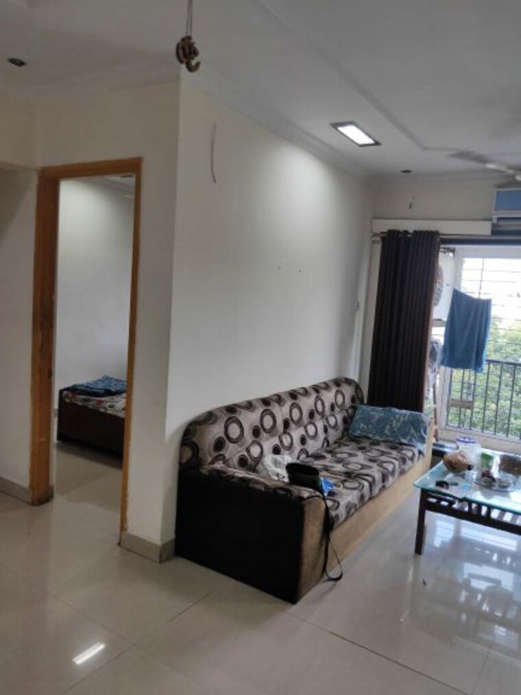 Living Room, triveni-vasant-vihar-chs 2 Bedroom 850 Sq.Ft. Apartment In Vasant Vihar Thane 10012784