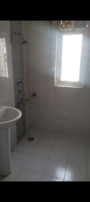 Bathroom in 3.5 BHK Apartment at Ansal API Celebrity Greens, Ashiyana – for Rent