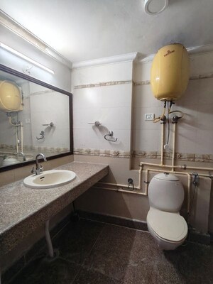 Bathroom in 4 BHK Builder Floor at Sukhdev Vihar – for Sale