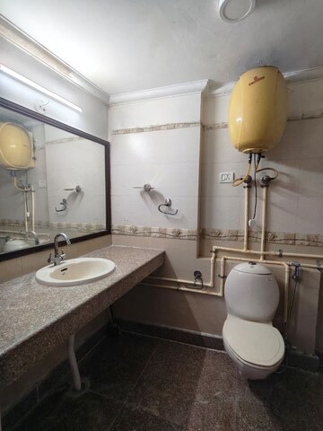 Bathroom in 4 BHK Builder Floor at Sukhdev Vihar – for Sale