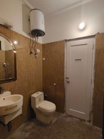 Bathroom in 4 BHK Builder Floor at Sukhdev Vihar – for Sale