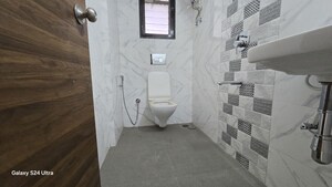 Bathroom in 1 BHK Apartment at Modispaces Amizarna, Malad West – for Rent