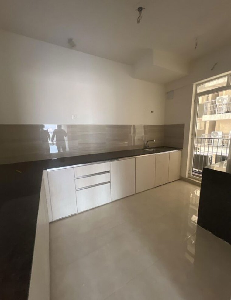 Kitchen, rosa-manhattan 3 Bedroom 911 Sq.Ft. Apartment In Ghodbunder Road Thane 10012872