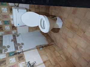 Bathroom in 1 BHK Apartment at MIT Payal Pride, Ghansoli – for Rent