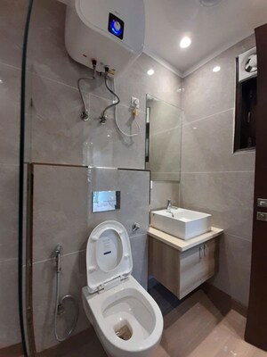 Bathroom in 3 BHK Builder Floor at South Extension I – for Sale