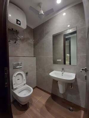 Bathroom in 3 BHK Builder Floor at South Extension I – for Sale